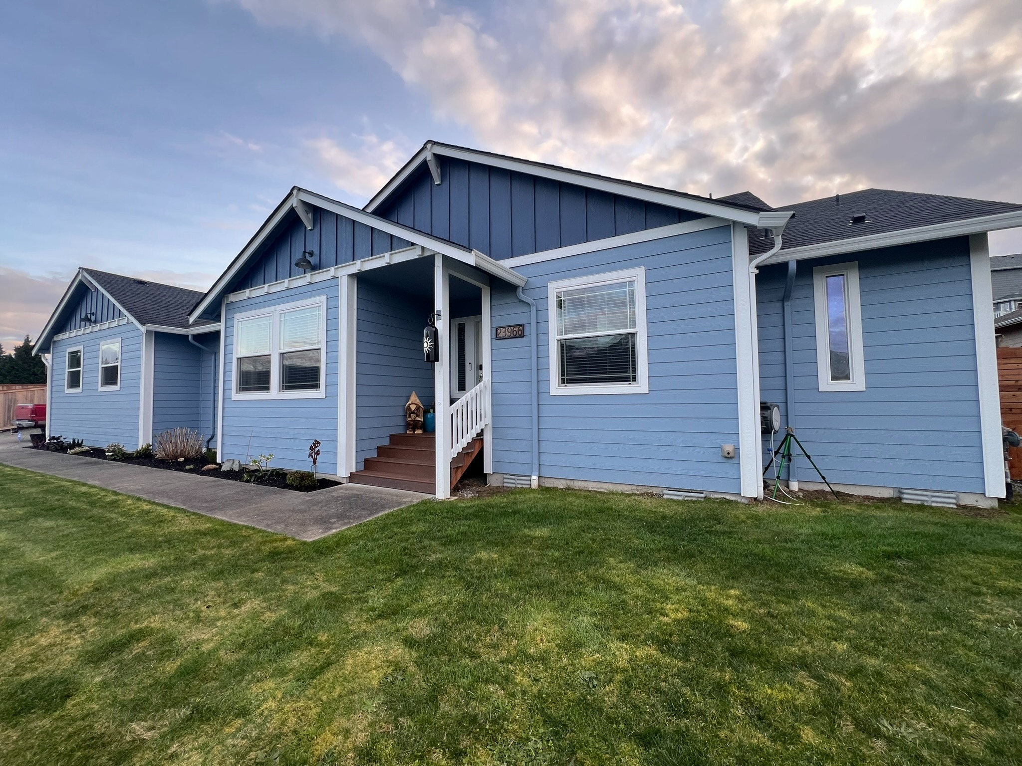 Wide view of the home exterior and finished entry area