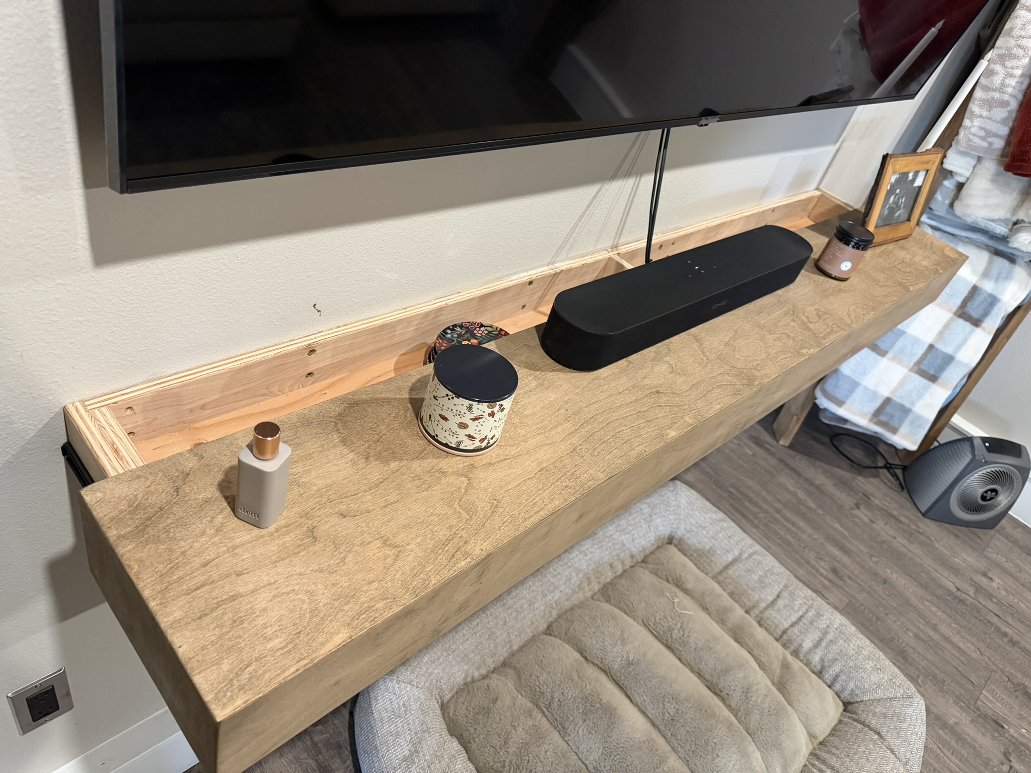 Close view of the finished floating shelf with concealed mounting structure